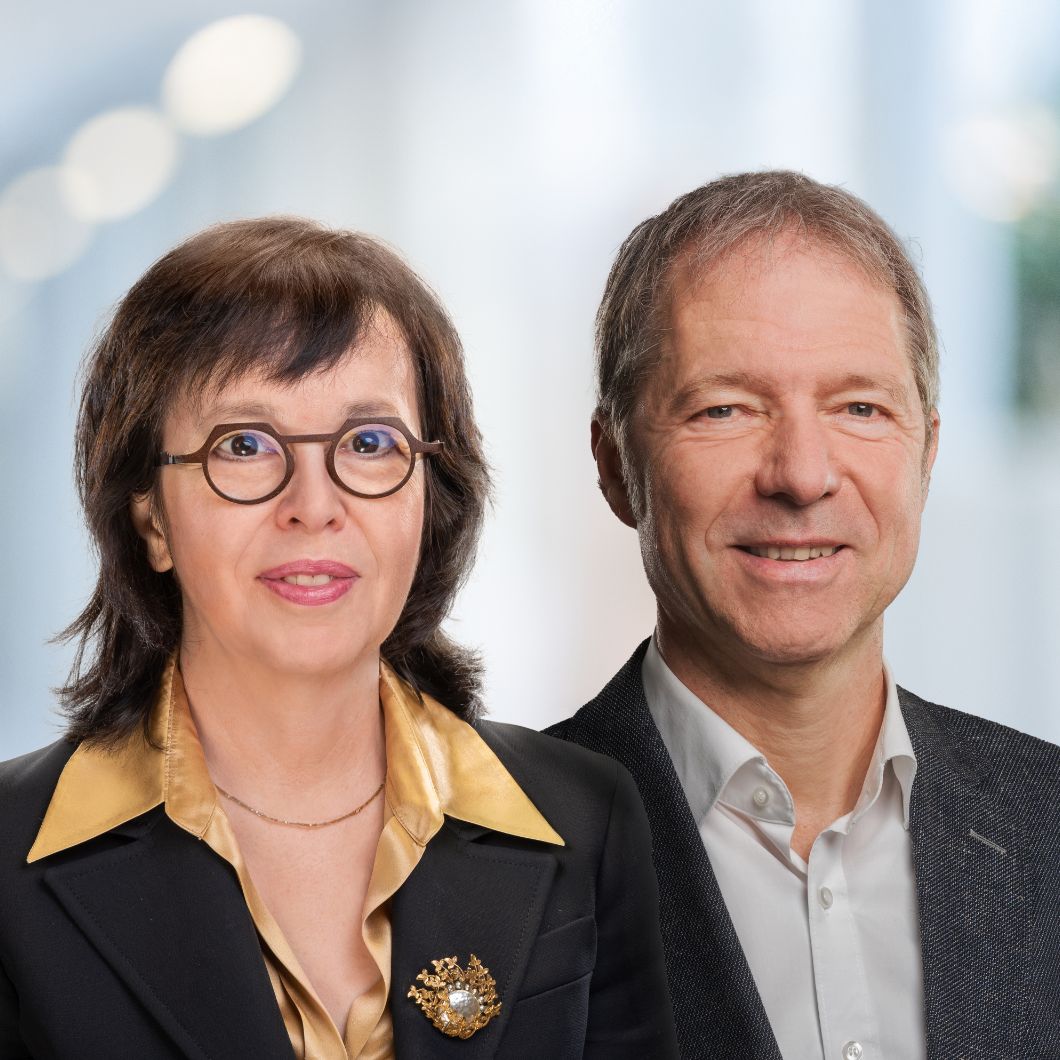 Portraits von Prof. Dr. Sabine Herpertz, Ärztliche Direktorin der Klinik für Allgemeine Psychiatrie, und Prof. Dr. Ralf Bartenschlager, Direktor der Abteilung Molekulare Virologie am Zentrum für Infektiologie.